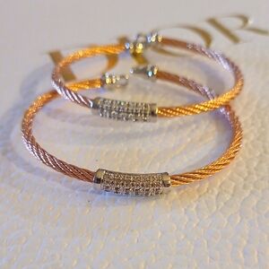 Elegant Gold and Silver Bracelet Set (may Be : Charriol 18k Gold Steel Diamondl)